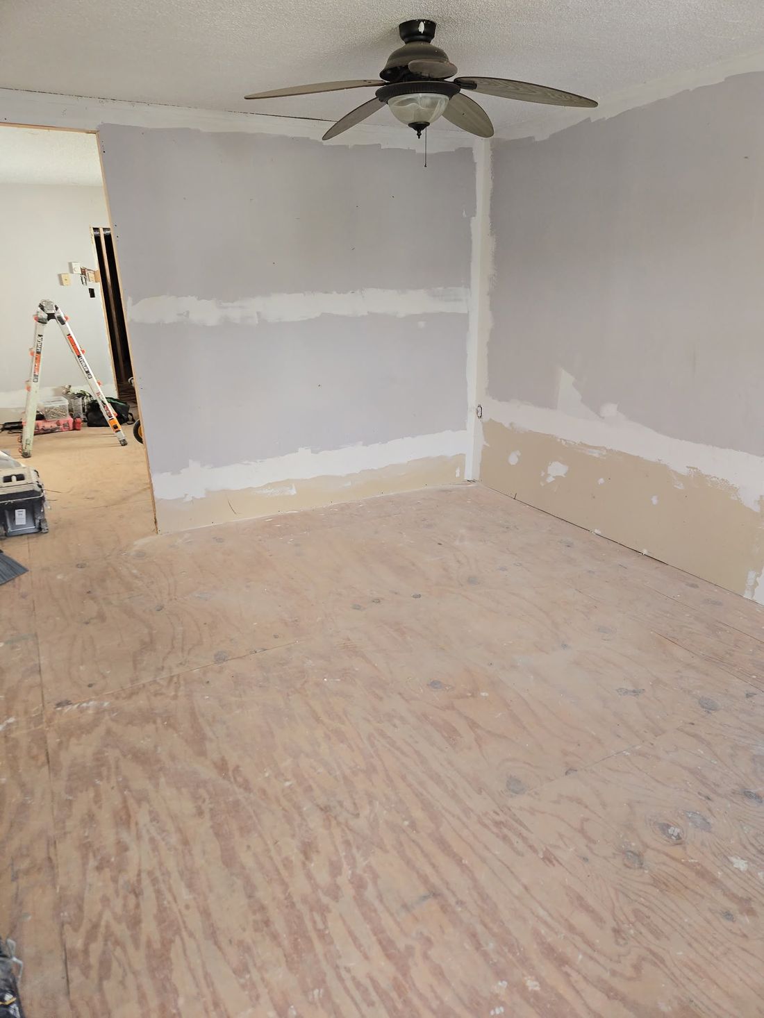 Same room fully cleared down to the subfloor after cleanout